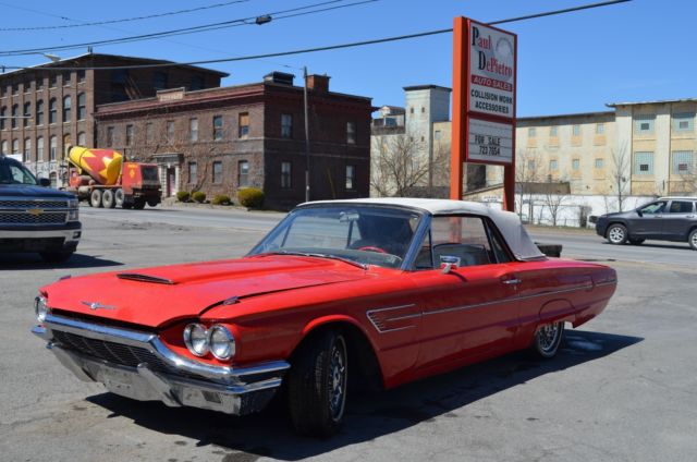 1965 red Ford Thunderbird