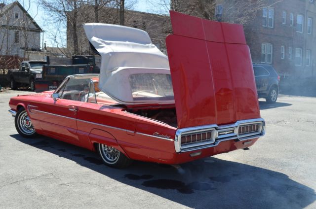 1965 red Ford Thunderbird