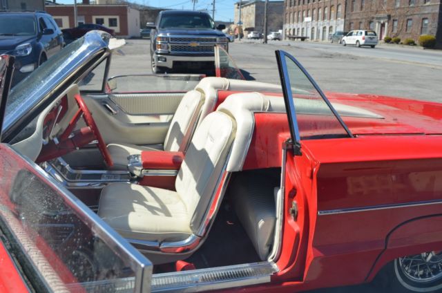 1965 red Ford Thunderbird