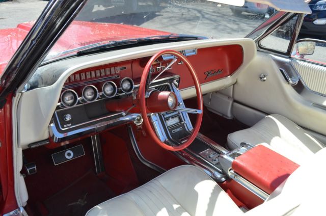 1965 red Ford Thunderbird