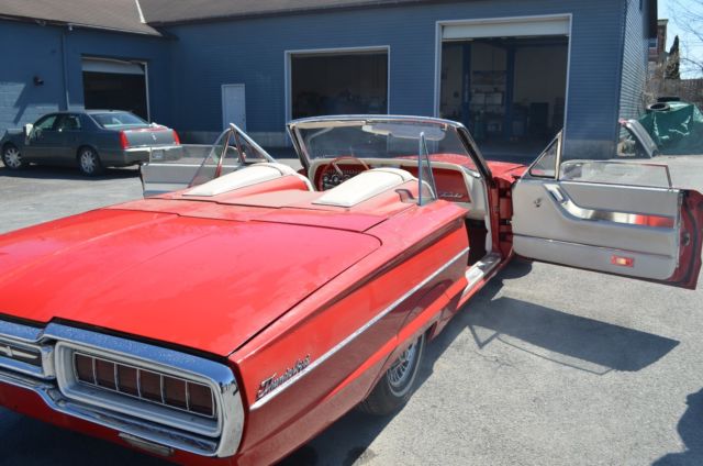 1965 red Ford Thunderbird