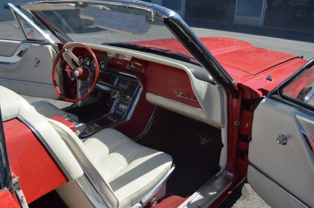 1965 red Ford Thunderbird