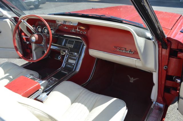 1965 red Ford Thunderbird