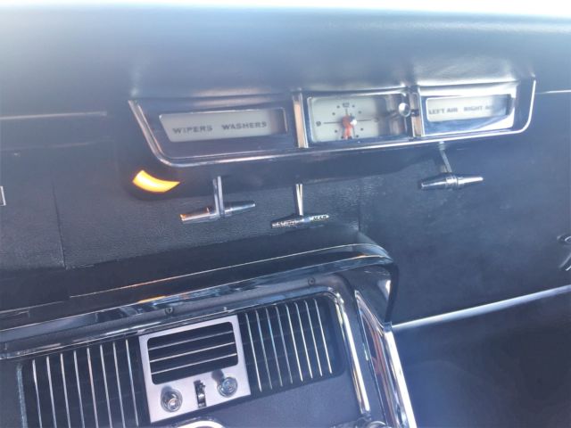 1965 Red Ford Thunderbird Convertible