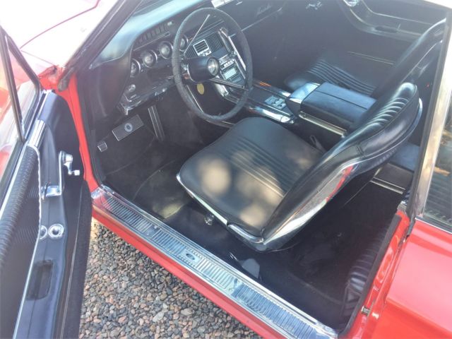 1965 Red Ford Thunderbird Convertible