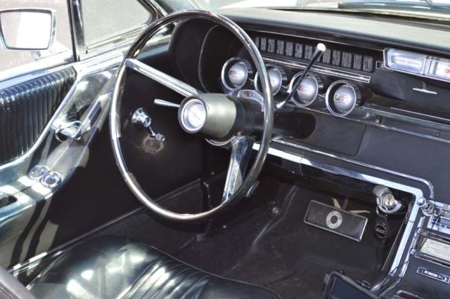 1965 White Ford Thunderbird Convertible