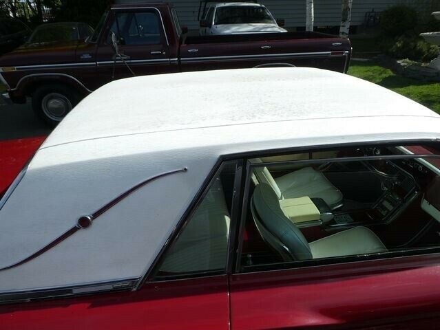 1965 Burgundy Ford Thunderbird --