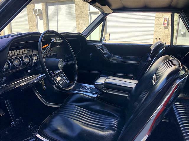 1965 Red Ford Thunderbird coupe