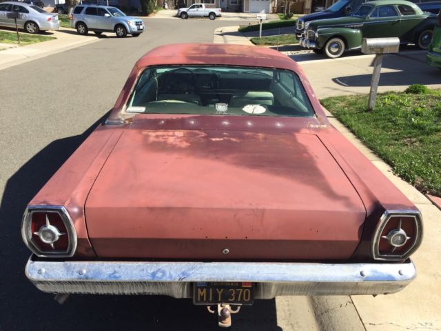 1965 Burgundy Ford Galaxie Coupe