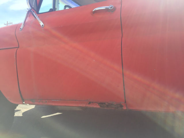 1965 Orange Chevrolet Suburban SUV