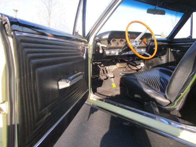 1965 yellow Pontiac GTO hardtop