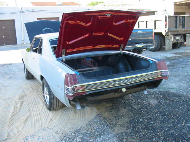 1965 grey primer Pontiac GTO Sedan