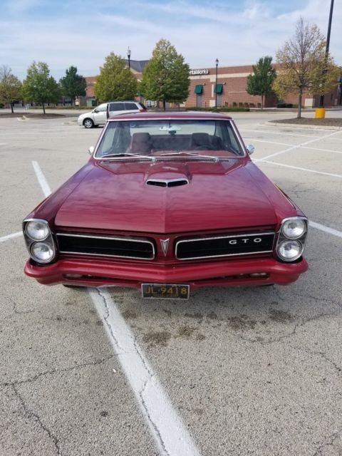 1965 Burgundy Pontiac GTO Coupe