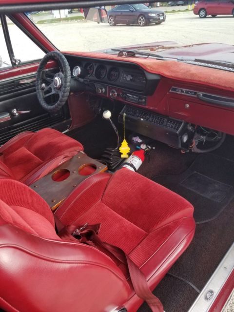 1965 Burgundy Pontiac GTO Coupe