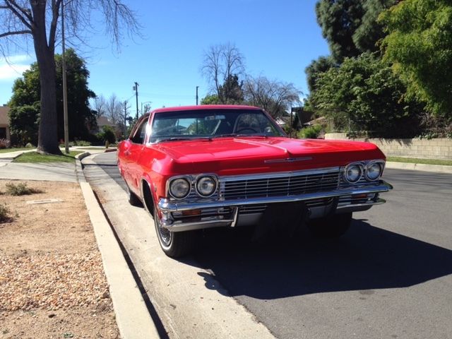 1965 Red Chevrolet Impala Coupe