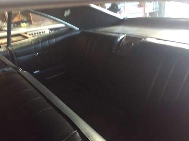 1965 Red Chevrolet Impala Coupe