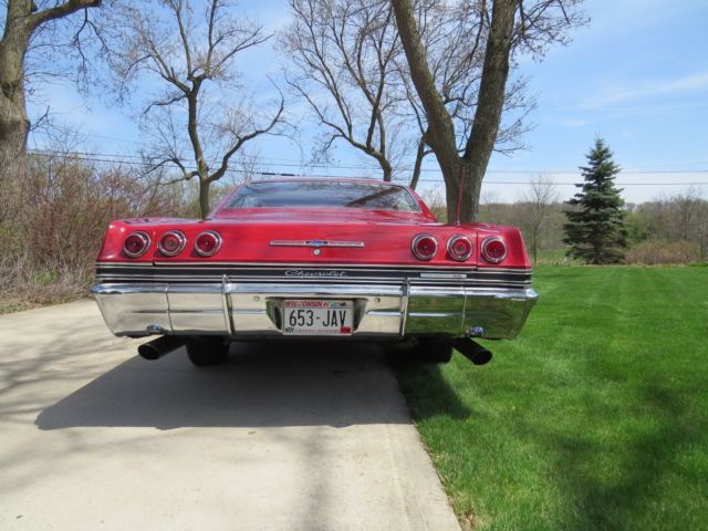1965 Red Chevrolet Impala Fastback