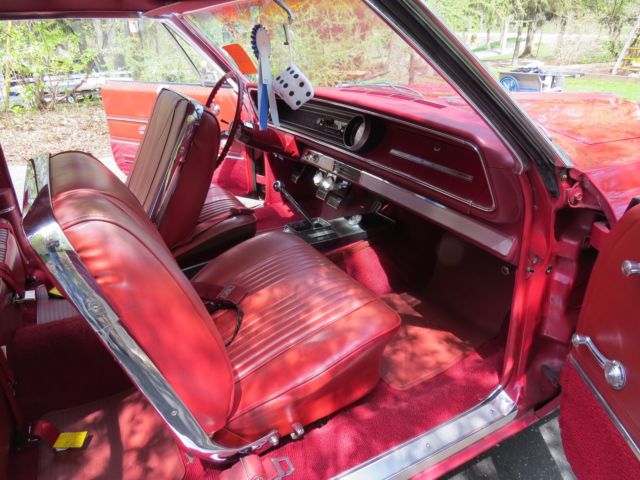 1965 Red Chevrolet Impala Fastback