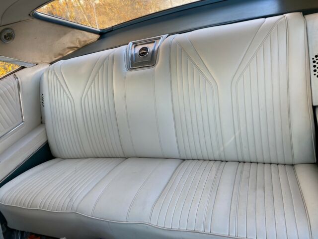 1965 Teal Chevrolet Impala Coupe