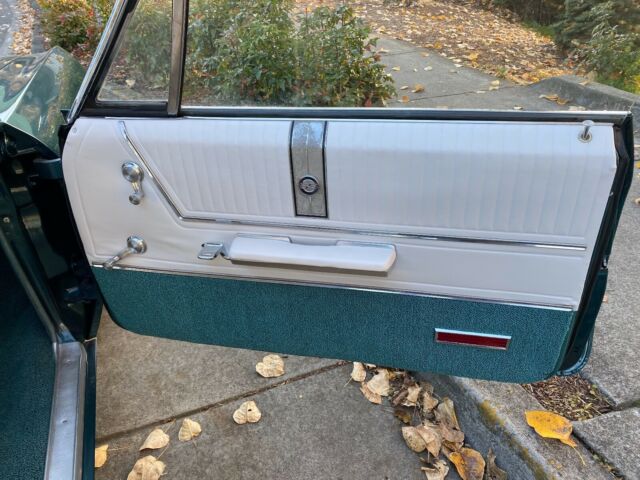 1965 Teal Chevrolet Impala Coupe