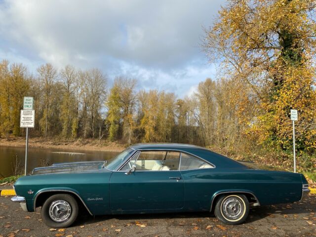 1965 Teal Chevrolet Impala Coupe