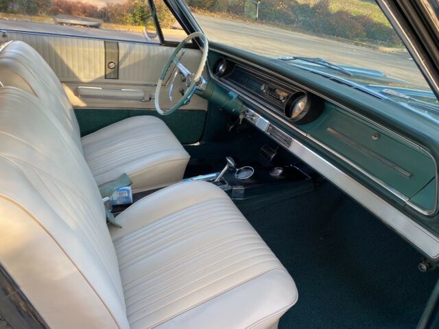 1965 Teal Chevrolet Impala Coupe