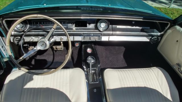 1965 Tourquiose Chevrolet Impala Convertible