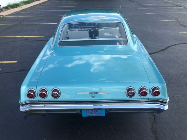 1965 Teal Chevrolet Impala Hardtop