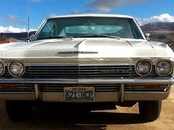 1965 White Chevrolet Impala Coupe