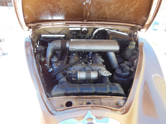 1965 Gold Jaguar S-Type Sedan