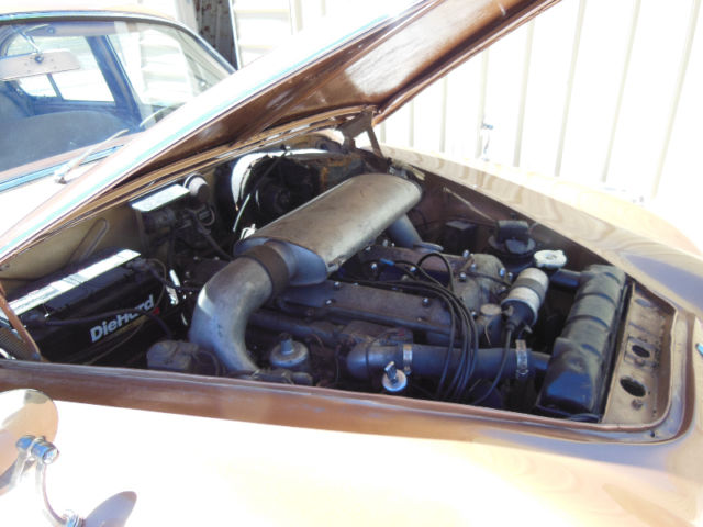 1965 Gold Jaguar S-Type Sedan
