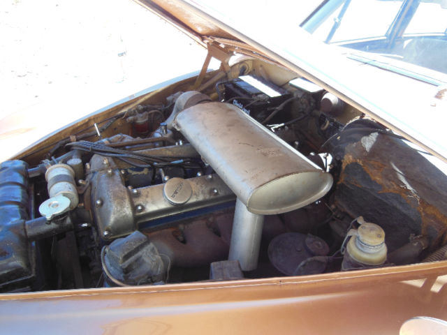 1965 Gold Jaguar S-Type Sedan