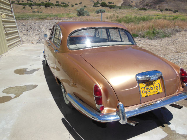 1965 Gold Jaguar S-Type Sedan