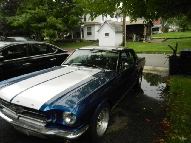 1965 blue w/white racing stripes Ford Mustang 2 door