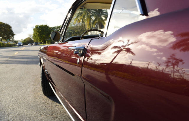 1965 Burgundy Ford Mustang