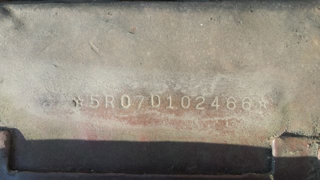 1965 brown Ford Mustang hardtop couple