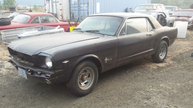 1965 brown Ford Mustang hardtop couple
