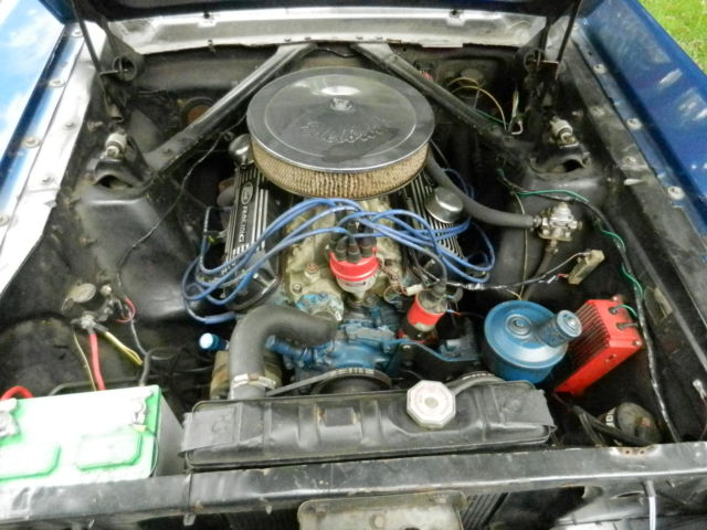 1965 blue w/white racing stripes Ford Mustang 2 door