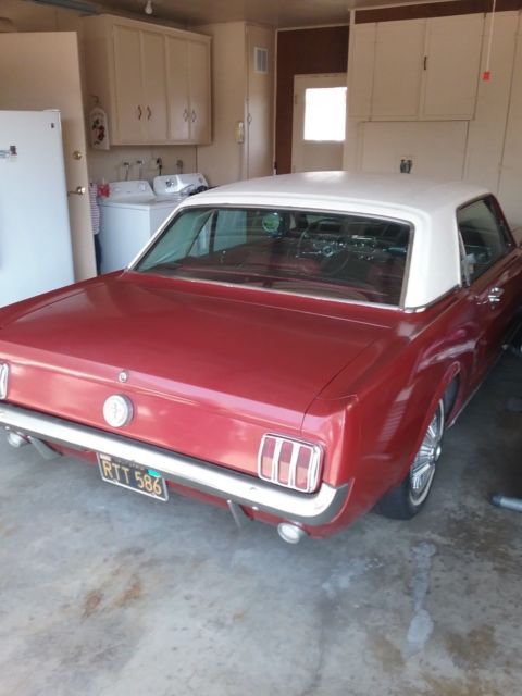 1965 Burgundy Ford Mustang Sedan