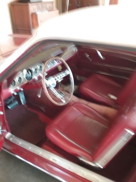 1965 Burgundy Ford Mustang Sedan