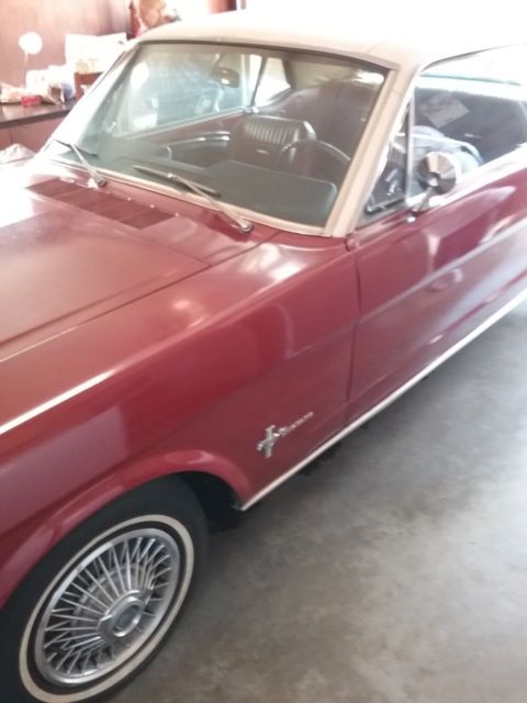 1965 Burgundy Ford Mustang Sedan