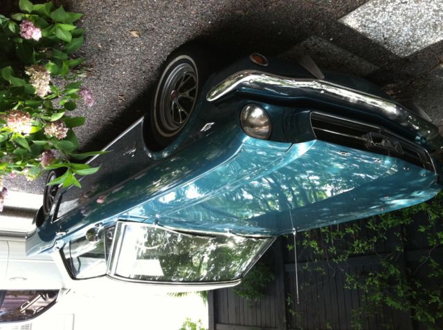 1965 Twilight Turquoise Ford Mustang 2 dorr