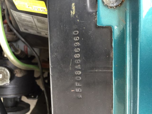 1965 Twilight Turquoise Ford Mustang 2 dorr