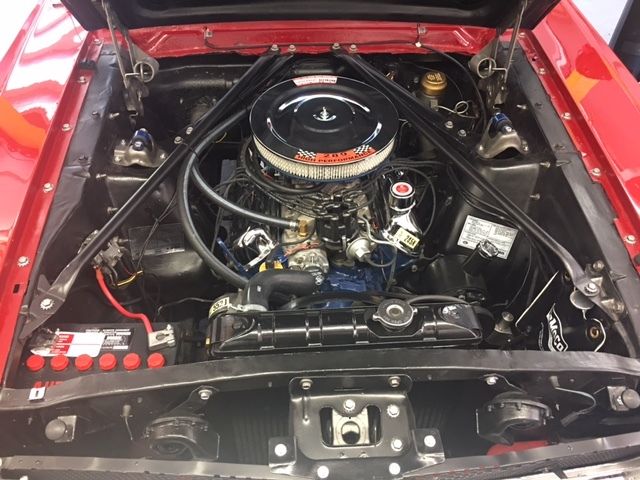 1965 red Ford Mustang Convertible