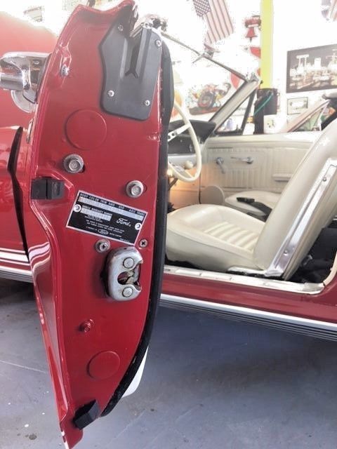 1965 red Ford Mustang Convertible