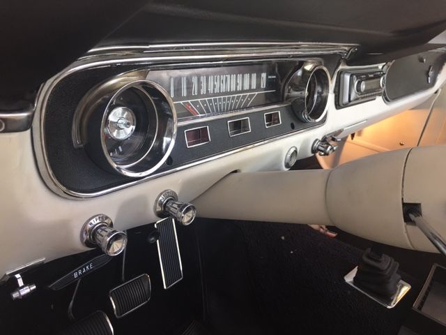 1965 red Ford Mustang Convertible