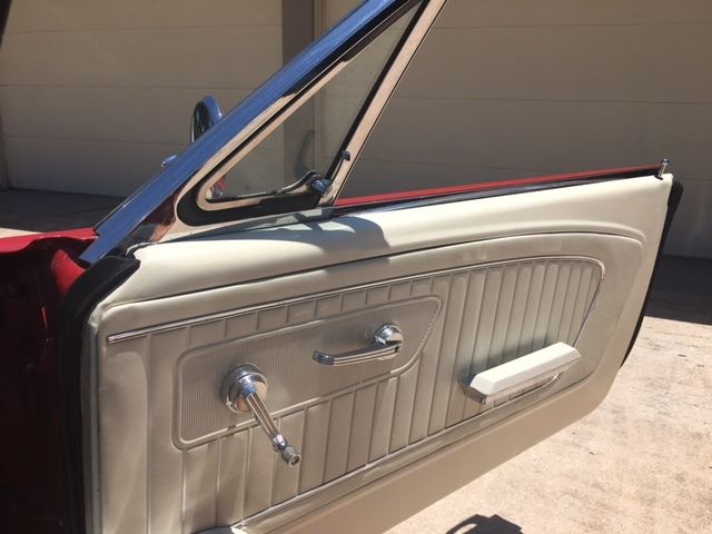 1965 red Ford Mustang Convertible