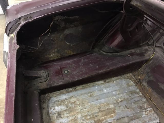 1965 Burgundy Ford Mustang Convertible