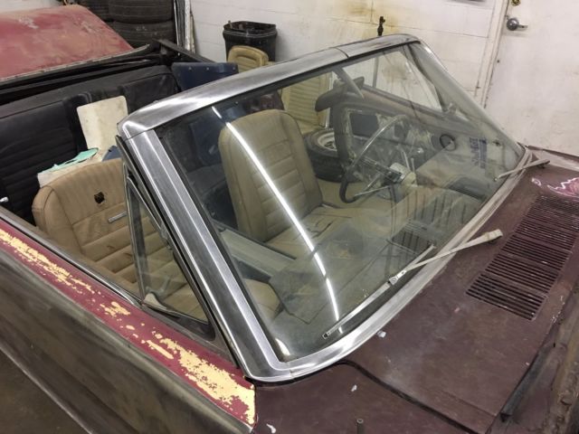 1965 Burgundy Ford Mustang Convertible