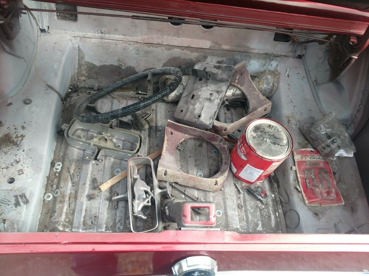 1965 Burgundy Ford Mustang Convertible